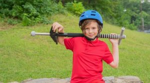 Pogo stick held by young boy