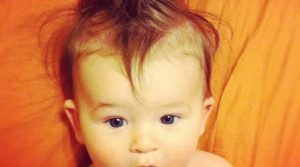 Photo of a baby with wild hair